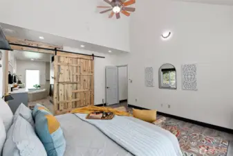 The custom barn door was also created by the homeowner which is another way nature is pulled into the interior of this home.