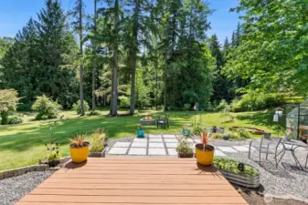 Enjoy coffee on one of the many outdoor spaces - covered front or back deck, or here with this beautiful expansive view.