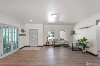As you enter the home, you are met with an office to the left and sitting room to the right.