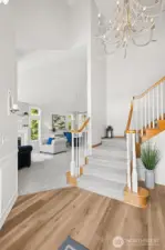 Grand entry with stately columns and beautiful staircase welcome you to this lovely home.