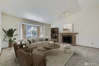 OPEN AND INVITING LIVING ROOM WITH PLENTY OF ROOM FOR FURNITURE, FRIENDS, AND FUN.