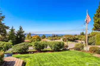 Enjoy scenic views of the Olympic Mountains, Maury Island and Puget Sound from the front yard. Wood patio for simple relaxing or entertain friends and family