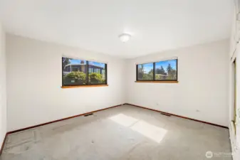 11' x 13' BEDROOM #1   Window to side and rear of home  Floor to ceiling built in closet, dresser with hanging space