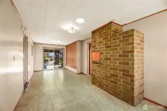 BONUS / FLEX ROOM  Door to slider to rear, and to garage with small doggy door  Vinyl tile floor / LOTS of built-in storage