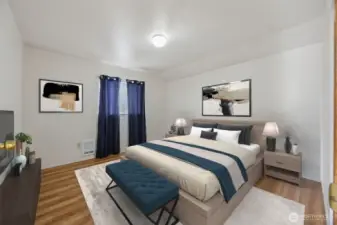 Comfortable and spacious bedroom in the detached unit, offering privacy and flexibility.