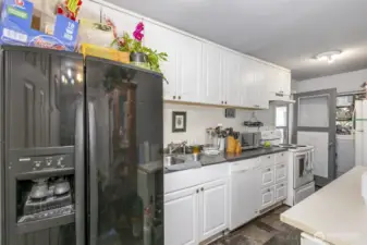 Kitchen with walk out to back yard