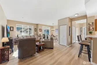 Gorgeous Luxury Vinyl Plank flooring and new paint flow throughout this light filled home (no carpet).