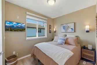 The two additional bedrooms share a tastefully updated bath that can create a 2-bedroom guest suite for your long, or short term, guests.