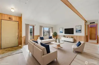 This is virtually staged, but as you can see the living room is very spacious, big windows let the natural pour in.