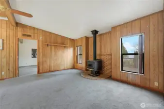 Another view of the large family room, the door on the left goes to primary suite.