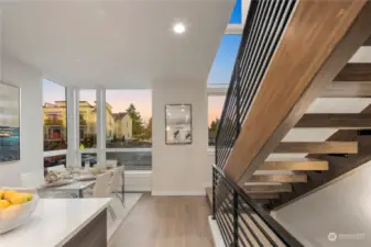 Floor to ceiling windows allow natural light to flood these homes.  The custom designed open staircases also allow for natural light through them.