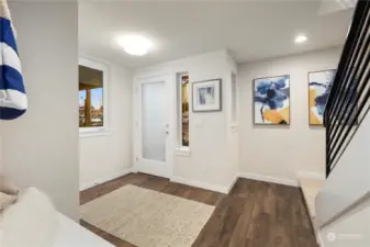 Imagine that....a front foyer!  Both plans at this community have full inviting entryways. Features include 2 storage closets, a built in bench with storage, hanging hooks and lots of space to add your personal art and furniture.