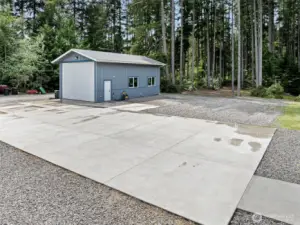 Sport court: pickleball anyone? HUGE detached garage holds 4+ vehicles, plumbed for a bath. Excellent hobby space, workshop, garage or entertainment zone!