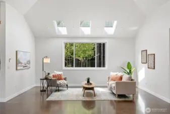 Living room with great view of fenced backyard.