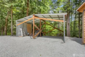 Metal framed woodshed