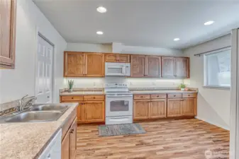 spacious kitchen w dining area