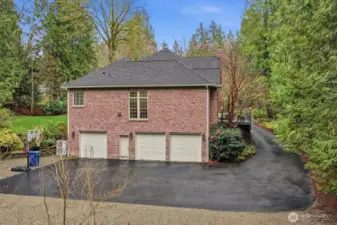 3 car garage and room for RV parking.
