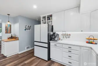 Additional fridge panels convey  (charcoal gray with matte stainless look)