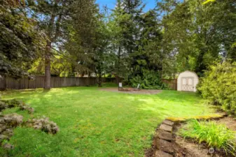 Private backyard, shed, firepit and more