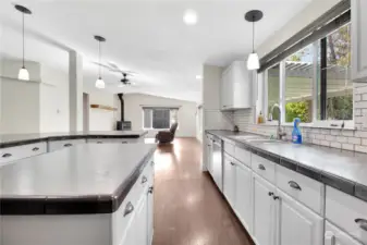 Look out into the living room with can lighting giving this home a bright and airy feel.