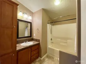 Guest bath near secondary bedrooms.