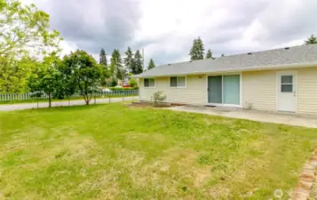 Beautiful back yard, with sliding glass door to the living room and separate entrance to that 4th bedroom on the other side of the house!