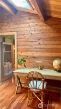 Office with vaulted ceilings and skylights