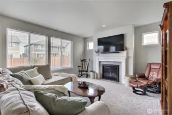 Spacious family room with gas fireplace.