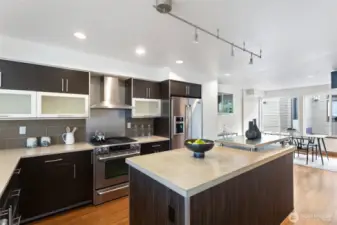 Kitchen includes a full pantry and sleek finishes