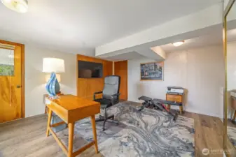 Optional office space, gym or family room. Exterior door leads to a private patio and private exterior entry.