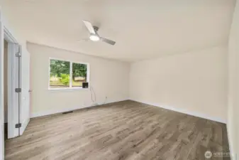 Large primary bedroom with its own walk-in closet and bath.