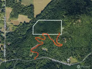 Overhead view with approximate boundaries in white and approximate easement in red.