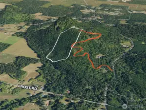 Overhead view with approximate boundaries in white and approximate easement in red.