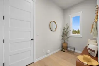 Mudroom off entry with garage access.