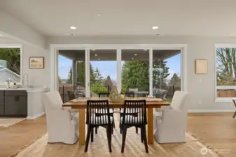 Main level dining area with access to covered deck.