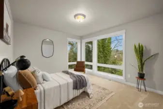 Upper level bedroom shared full bath.