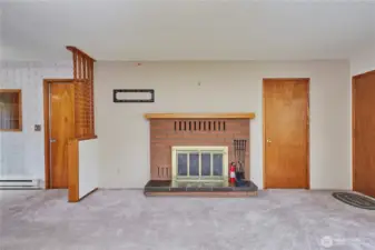 Another View of Fireplace and Front Door to Right