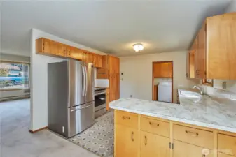 Kitchen With Laundry Room To The Back