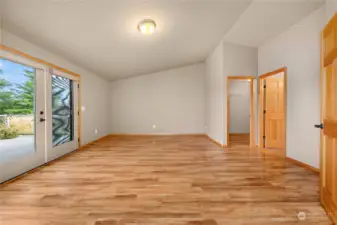 Master bedroom with French doors to deck