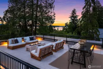 Private western facing rooftop deck with lake and mountain views