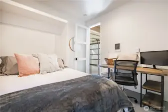 Lower level flex room is currently used as a non-conforming bedroom and office space.
