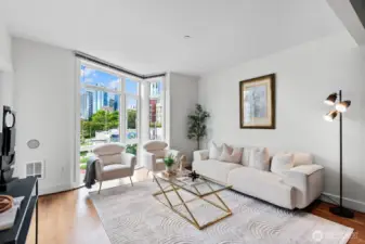 Floor-to-ceiling windows in the living room to check out the city.