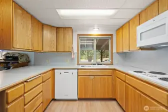 Kitchen with lots of prep room, cabinets and storage.