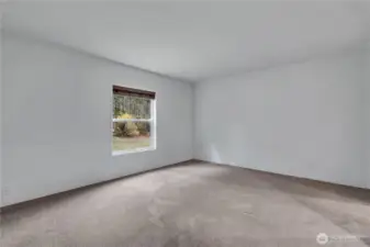 Large primary suite with en-suite bath and walk in closet