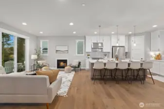 Open-concept main floor living space with gourmet kitchen.