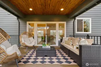 Covered deck on main level off dining.