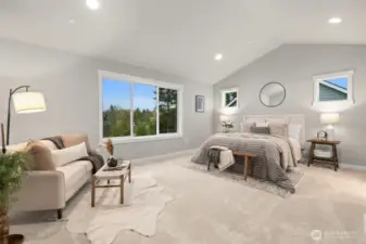 Guest Suite on the upper level with a 5 piece bathroom and generous walk-in closet.