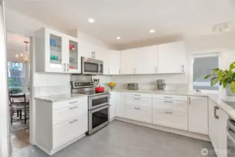 Kitchen is located in the back of the home