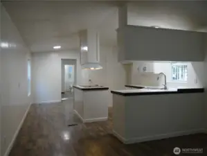 View From Entry at Living Room to Kitchen Back to Owners Suite