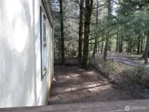 Laundry Room / Mud Room  Back Porch Entry. View to East Backside of Home
